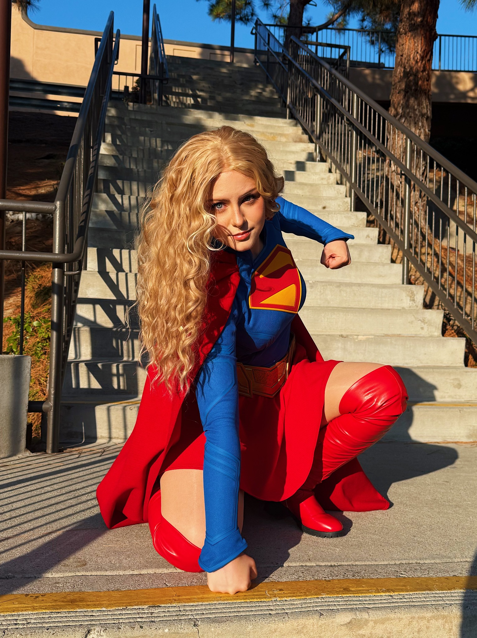 Charlie in a Supergirl cosplay